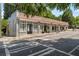 Commercial building with multiple storefronts and a tiled roof at 1187 Rambler Cross, Atlanta, GA 30312