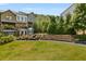 Landscaped area with a stone water feature and seating at 1187 Rambler Cross, Atlanta, GA 30312