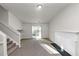 Bright living room with fireplace, carpet and sliding doors at 2089 Glenwood Downs Dr, Decatur, GA 30035