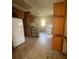 Kitchen with wood cabinets and white appliances at 214 Pinewood Ln, Stockbridge, GA 30281