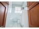 Clean bathroom with white tile and vanity at 2580 County Line Sw Rd, Atlanta, GA 30331