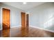 Hardwood floor bedroom with neutral walls and ample natural light at 2580 County Line Sw Rd, Atlanta, GA 30331