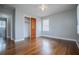 Hardwood floor bedroom with window and closet at 2580 County Line Sw Rd, Atlanta, GA 30331