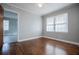 Spacious bedroom featuring hardwood floors and a view of another room at 2580 County Line Sw Rd, Atlanta, GA 30331