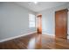 Hardwood floor bedroom with neutral walls and ample natural light at 2580 County Line Sw Rd, Atlanta, GA 30331