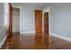 Bright bedroom featuring hardwood floors and neutral walls at 2580 County Line Sw Rd, Atlanta, GA 30331