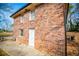 Brick side of house with white door and window at 2580 County Line Sw Rd, Atlanta, GA 30331