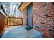 Wooden deck and security door leading into the house at 2580 County Line Sw Rd, Atlanta, GA 30331