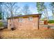 Brick house exterior showcasing a side view with a deck at 2580 County Line Sw Rd, Atlanta, GA 30331