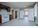 Updated kitchen with white appliances and dark wood cabinets at 2580 County Line Sw Rd, Atlanta, GA 30331