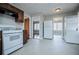 Updated kitchen with white appliances and dark wood cabinets at 2580 County Line Sw Rd, Atlanta, GA 30331