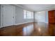 Bright living room with hardwood floors and neutral walls at 2580 County Line Sw Rd, Atlanta, GA 30331