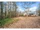 House with spacious backyard with lush trees and deck at 6389 Grafton Dr, Austell, GA 30168