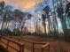 Backyard with a walkway leading up to the house, scenic sky at 6389 Grafton Dr, Austell, GA 30168