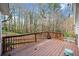 This wooden deck is a great location for relaxation and has a view of the wooded backyard at 6389 Grafton Dr, Austell, GA 30168