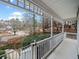 Covered porch with white railings offering scenic neighborhood views at 6389 Grafton Dr, Austell, GA 30168