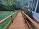 Wooden walkway through lush greenery leading to the house at 6389 Grafton Dr, Austell, GA 30168