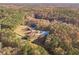 Aerial view of house and property, showcasing expansive land at 686 Newton Factory Bridge Rd, Covington, GA 30014