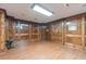 Finished basement with wood paneled walls and projector at 686 Newton Factory Bridge Rd, Covington, GA 30014