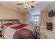 Comfortable bedroom with a ceiling fan and window seat at 686 Newton Factory Bridge Rd, Covington, GA 30014