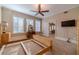 Bright basement bedroom with wood furniture at 686 Newton Factory Bridge Rd, Covington, GA 30014