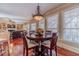 Charming breakfast nook with a wood table and chairs, perfect for enjoying meals at 686 Newton Factory Bridge Rd, Covington, GA 30014