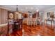 Kitchen dining area with hardwood floors and a chandelier at 686 Newton Factory Bridge Rd, Covington, GA 30014