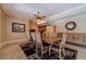 Basement dining room with wood table and seating at 686 Newton Factory Bridge Rd, Covington, GA 30014