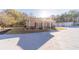 House exterior features a large driveway and detached garage at 686 Newton Factory Bridge Rd, Covington, GA 30014