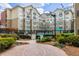 Community courtyard with brick pathway and landscaping at 800 Peachtree St # 1112, Atlanta, GA 30308