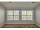 Bright bedroom with two large windows and neutral decor at 2372 Johnson Rd, Atlanta, GA 30345