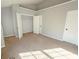 Bright bedroom with neutral walls and carpet at 2372 Johnson Rd, Atlanta, GA 30345