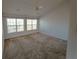 Primary bedroom with two large windows and high ceiling at 2372 Johnson Rd, Atlanta, GA 30345