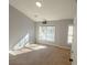 Spacious bedroom with vaulted ceiling and large window at 2372 Johnson Rd, Atlanta, GA 30345