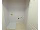 Laundry closet with shelving and drain at 2372 Johnson Rd, Atlanta, GA 30345