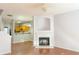 Living room with fireplace and kitchen view at 2372 Johnson Rd, Atlanta, GA 30345