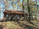 House with porch and tree-filled yard at 3174 Glen Hollow Dr, Rex, GA 30273