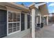 House exterior showcasing a covered entryway with columns and shutters at 4955 R H Smith Blvd Blvd, Sugar Hill, GA 30518