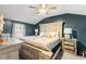 Large main bedroom with a king-size bed and plenty of natural light at 4955 R H Smith Blvd Blvd, Sugar Hill, GA 30518