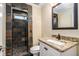 Modern bathroom with slate shower and granite countertop at 683 Terry Se St, Atlanta, GA 30315