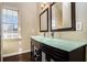 Bathroom with double vanity and a large window at 683 Terry Se St, Atlanta, GA 30315