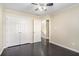 Spacious bedroom with dark hardwood floors and access to upper level at 683 Terry Se St, Atlanta, GA 30315