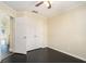 Bedroom with dark hardwood floors and double door closet at 683 Terry Se St, Atlanta, GA 30315