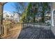 Wooden deck overlooks a fenced backyard and neighborhood homes at 683 Terry Se St, Atlanta, GA 30315