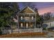 Two-story house with front porch and white picket fence at 683 Terry Se St, Atlanta, GA 30315