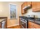 Kitchen with stainless steel appliances and wood cabinets at 683 Terry Se St, Atlanta, GA 30315