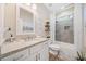 Clean bathroom with granite countertop, white cabinets, and a grey tiled shower/tub combo at 754 Somersby Dr, Dallas, GA 30157