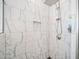 Large walk-in shower with marble tile and modern fixtures at 754 Somersby Dr, Dallas, GA 30157