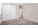 Spacious bedroom with double-door closet and carpeting at 459 Oak Se Dr, Atlanta, GA 30354