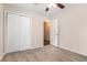 Carpeted bedroom with double door closet and neutral wall color at 459 Oak Se Dr, Atlanta, GA 30354